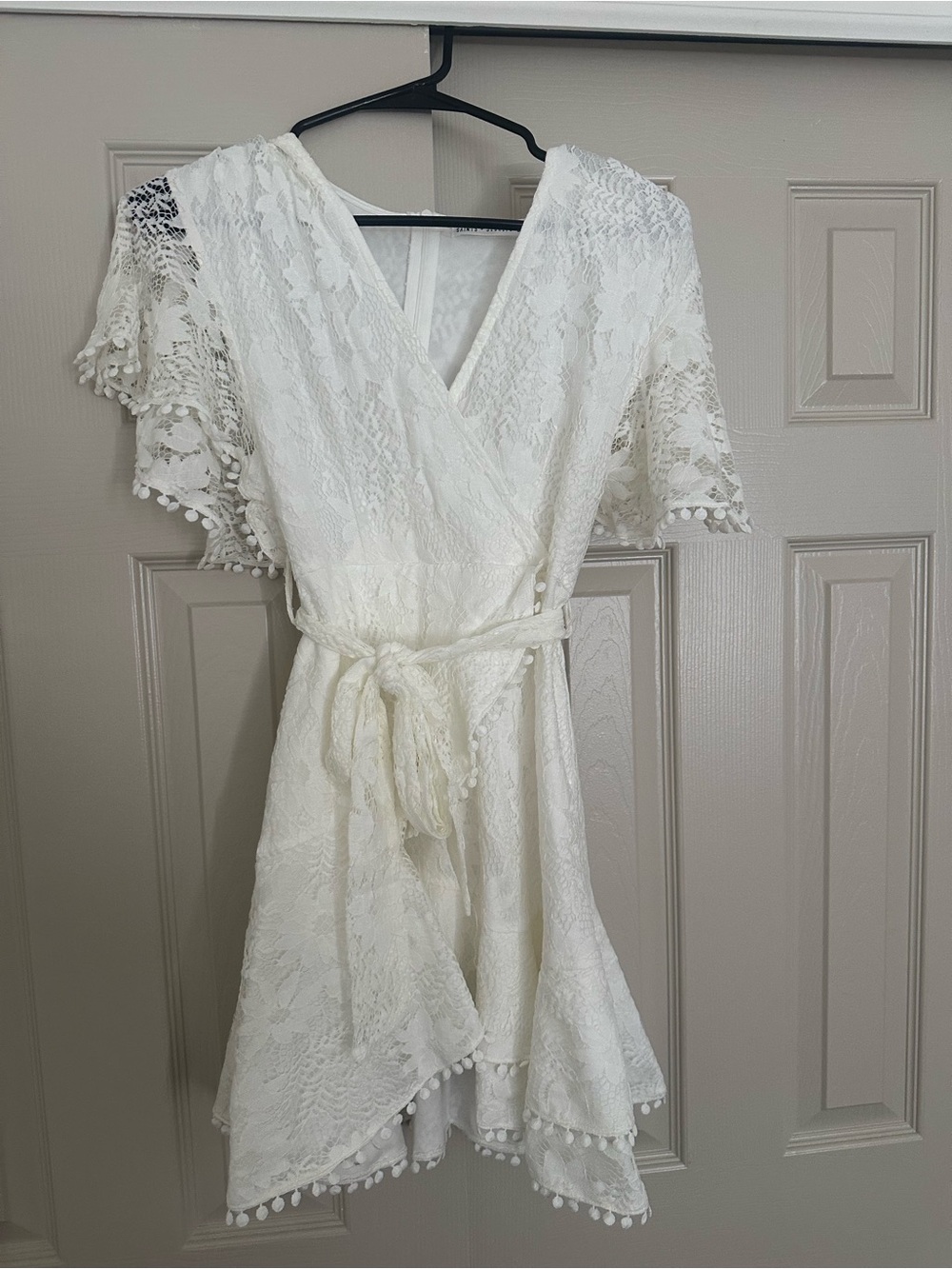 White Lace Wrap Dress with Pom Trim